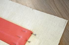 Slanted pocket with a stitched welt